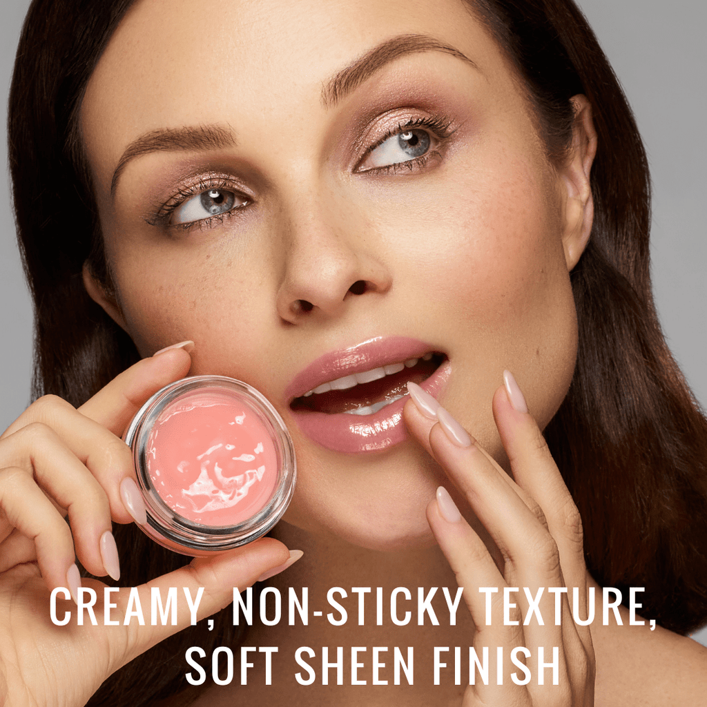 Close-up of woman using Runway Rogue Plump N’ Fill Lip Treatment with creamy texture and glossy soft sheen