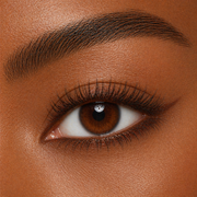 close up of a brown eye with a soft smokey eye created with Runway Rogue long wear eyeliner in the shade 'Milk Chocolate'