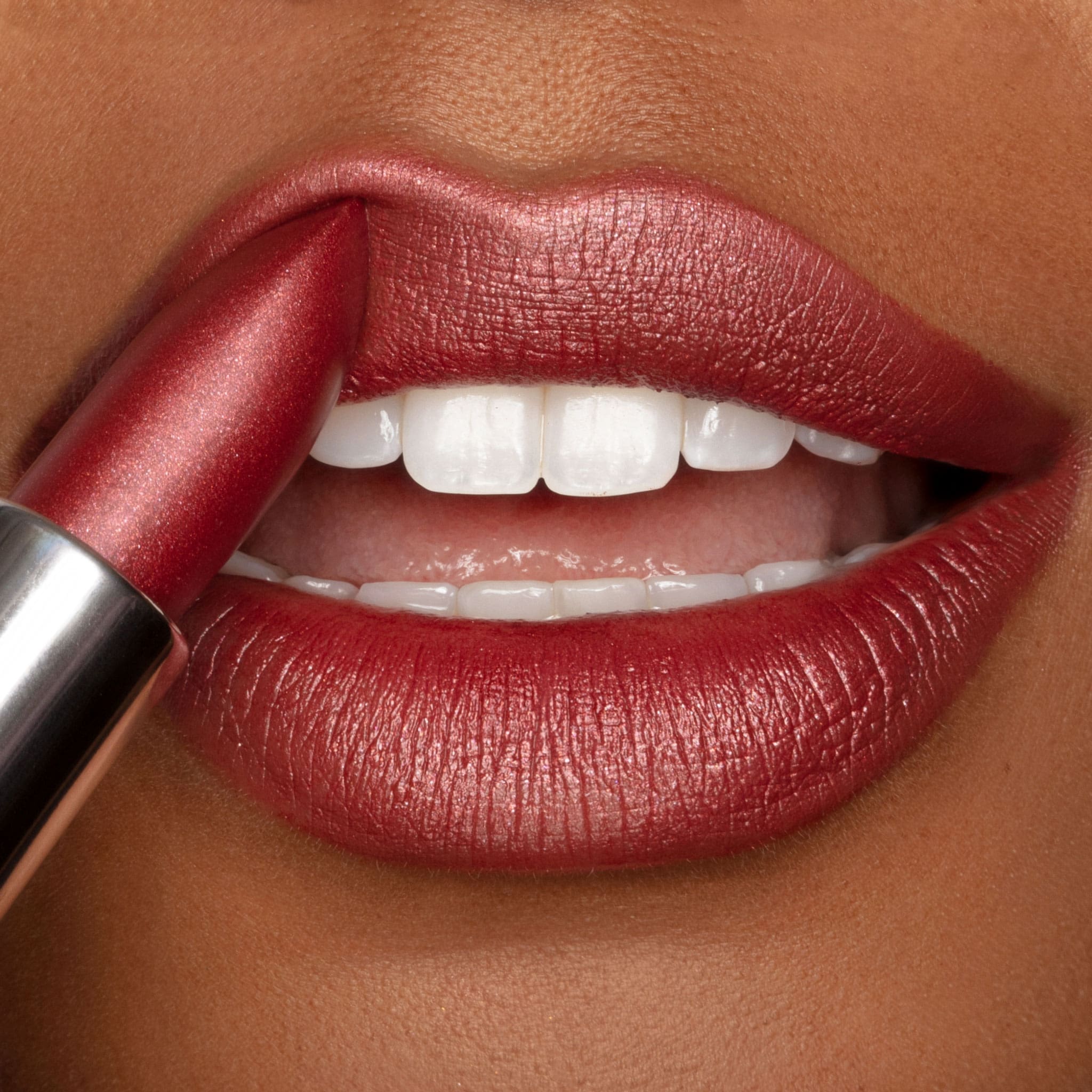 Ritzy Crème | A Warm Earthy Red with Gold Shimmer Lipstick – Runway Rogue