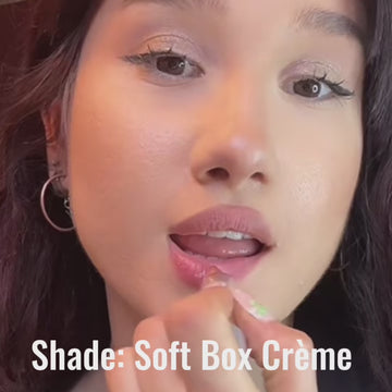 Application video highlighting the soft nude pink shimmer finish of Runway Rogue Satin Shimmer Crème Lipstick in Soft Box