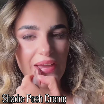 Close-up video showing smooth application of Satin Shimmer Crème Lipstick in 'Posh Creme' a soft golden nude lipstick with a frosted, luminous finish.”