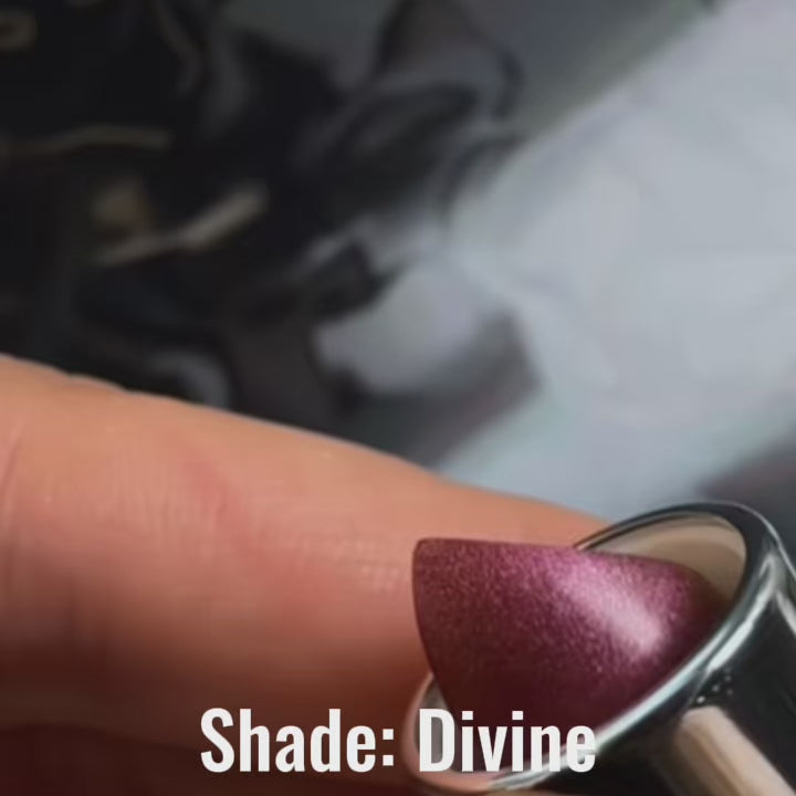 Close-up video showing smooth application of Satin Shimmer Crème Lipstick in Divine Crème, a dusty blush mauve with a creamy, light-reflective finish