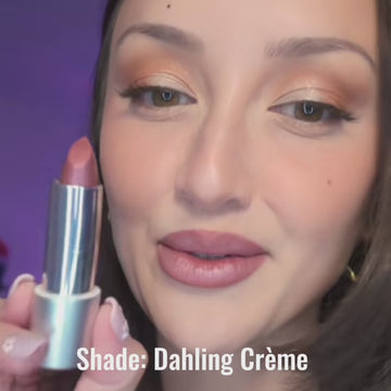 Close-up video showing smooth application of Satin Shimmer Crème Lipstick in Dahling with a creamy, luminous finish