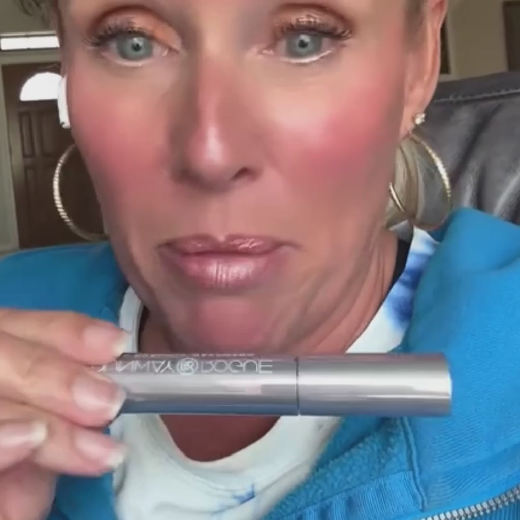 Close-up of woman demonstrating the long-lasting wear of Runway Rogue Long Wear Liquid Lipstick in Soft Box