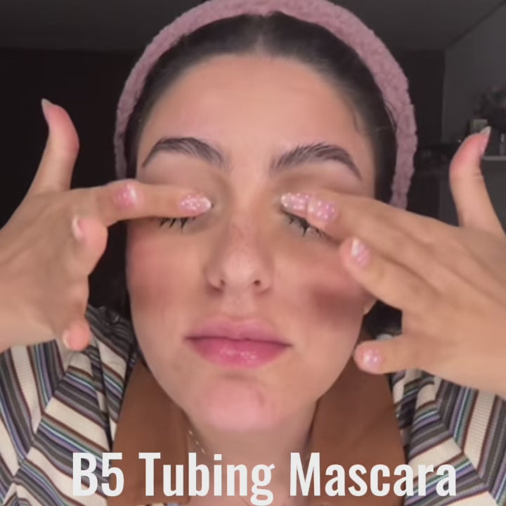 Demonstration video of Runway Rogue B5 Tubing Mascara tubes sliding off with warm water for quick, clean removal. 